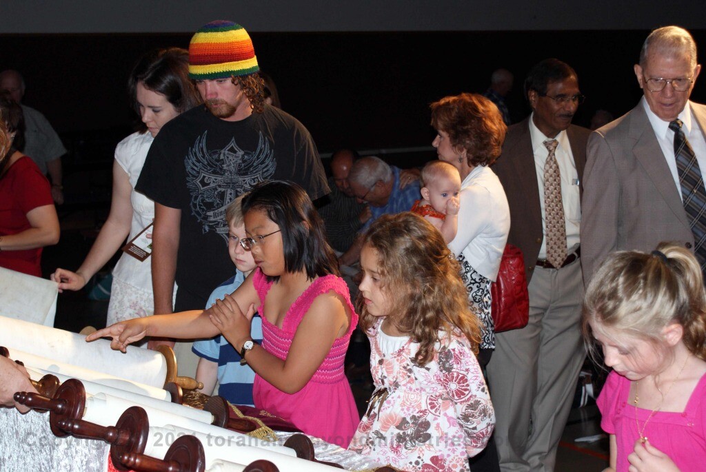Children viewing Hebrew Scrolls in Dallas, Texas