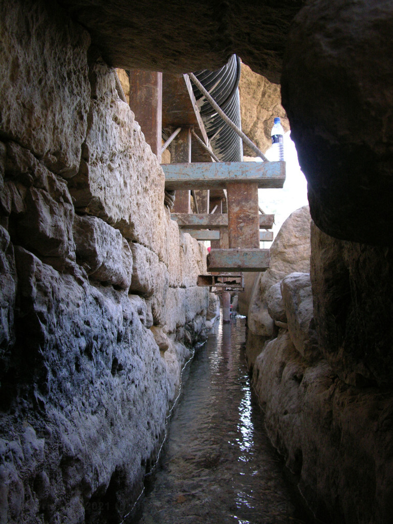 Water flowing from Hezekiah's tunnel into the Pool of Siloam.