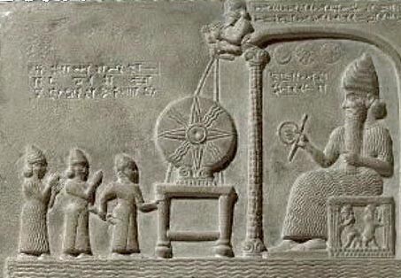 Great Tribulation Ashur5 measuring rod The sun-god Shamash holding a ring of coiled rope and a rod